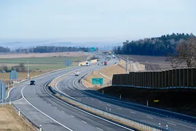 Panoramic view of the D3 motorway in the Czech Republic with direction signs to Praha, České Budějovice and Kamenný Újezd, captured on February 26, 2026