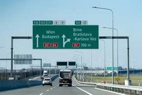 Motorway direction sign on the Slovak D2/D4 near Bratislava showing directions to Wien, Budapest, Brno and the Czech border via the E65